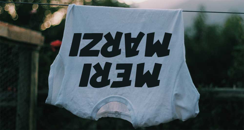 A carefree girl wearing a printed T-Shirt with a message for Humanity