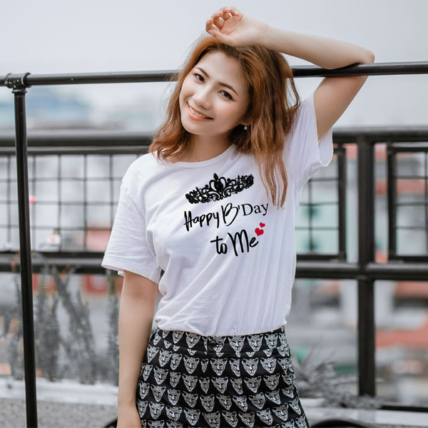 a beautiful girl wearing t-shirt with Happy Birthday message