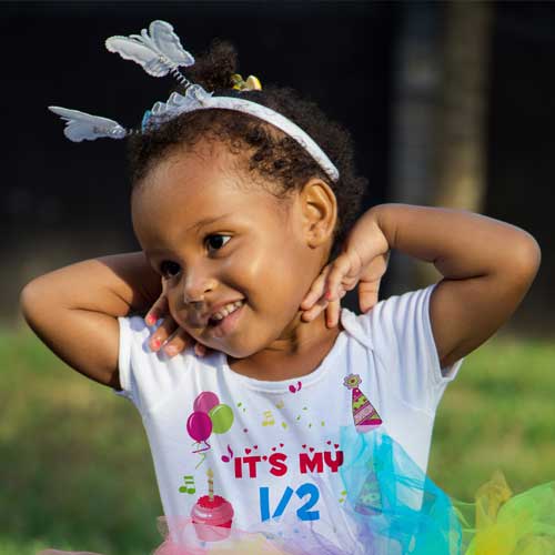 baby wearing birthday t-shirt